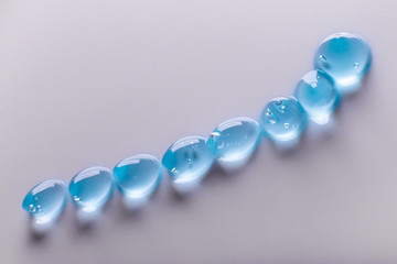 Cream gel transparent cosmetic sample texture with bubbles isolated on white background. Cosmetic cream transparent gel serum texture with micro bubble on white background beauty concept