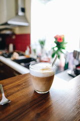cup of coffee on wooden table