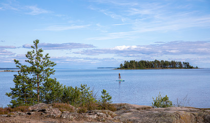 woman on a stand up paddel