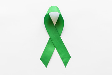 World lymphoma and mental health awareness day ribbon on white backdrop