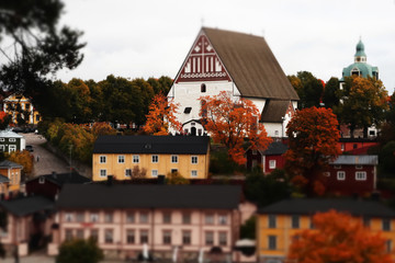Fototapeta na wymiar View of old Porvoo, Finland. Beautiful city autumn landscape with Porvoo Cathedral and colorful wooden buildings.