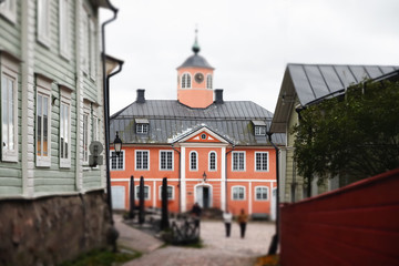 Fototapeta premium Street of Old Porvoo, Finland. Beautiful city autumn landscape with Old Town Hall.