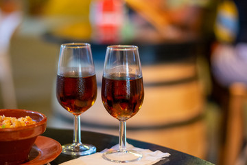 Sherry wine tasting, selection of different jerez fortified wines from dry to very sweet in glasses, Jerez de la Frontera, Andalusia, Spain