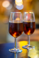 Christmas sherry wine, dry or sweet jerez fortified wine in glasses and street lights, Jerez de la Frontera, Andalusia, Spain