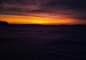 Fototapeta na wymiar Snowy sunset