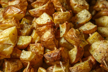 Grilled potatoes on wooden skewers