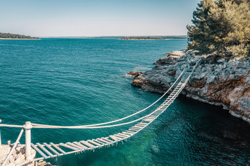 Above the rope bridge over a cliff in Punta Christo, Pula, Croatia - Europe. Travel photography,...