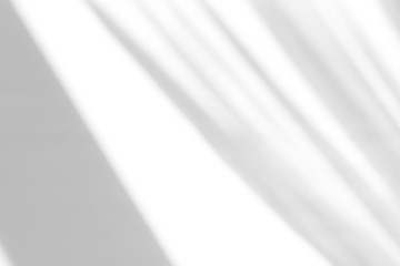 Organic drop diagonal shadow on a white wall, overlay effect for photo and mockups