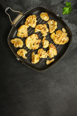 cauliflower grilled (fried grill vegetables or snack salad, bruschetta with tomato) menu concept. food background. copy space. Top view