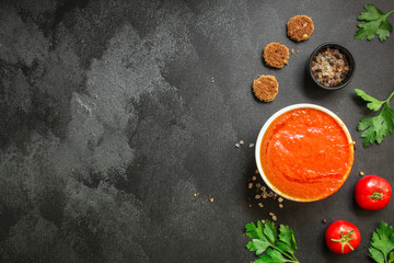 gazpacho, tomato or carrot soup with vegetables (delicious feather dish, healthy cooking) menu concept. food background. copy space. Top view