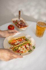 Authentic mexican tacos with beer. Mexican tacos with ground meat, beef, beans, onions and salsa