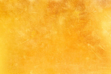 Fototapeta na wymiar Gold abstract background or texture distress scratch and gradients shadow