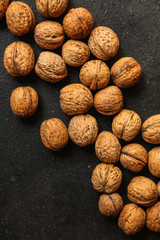 Walnuts, tasty and healthy (whole nuts) menu concept. food background. copy space. Top view 
