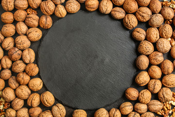 Walnuts, tasty and healthy (whole nuts) menu concept. food background. copy space. Top view 