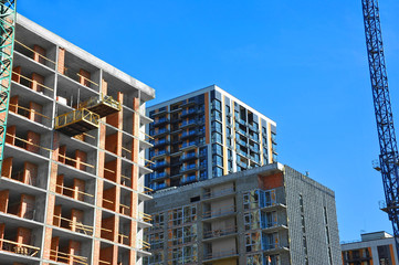 Crane and highrise construction site