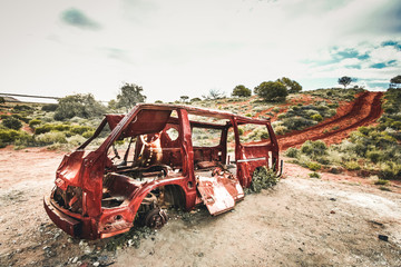 rusty abandoned van in australian desert