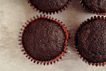 Homemade dark chocolate cupcakes, selective focus