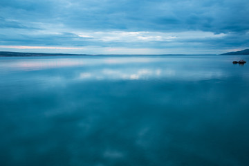 Sea and sky with clouds at sunset.