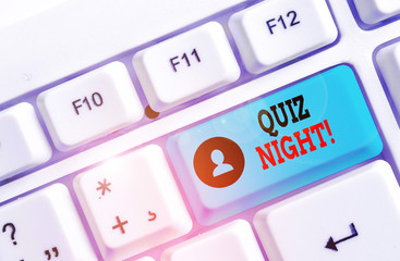 Conceptual hand writing showing Quiz Night. Concept meaning evening test knowledge competition between individuals White pc keyboard with note paper above the white background