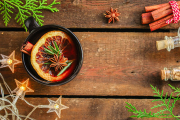 mulled wine, fragrant drink and festive mood atmosphere - concept New Year, Christmas. food background. copy space