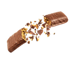 Chocolate bar with nougat is torn in the air on white background