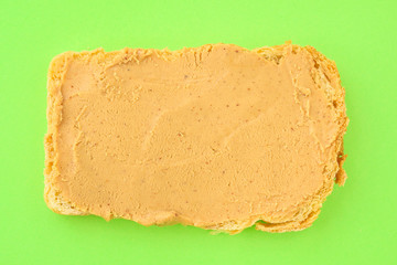 peanut butter sandwich (tasty snack, bread toast buttered with nut butter) menu concept. food background. copy space. Top viev