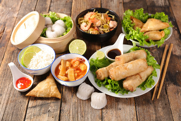 assorted of asian food, spring roll, samossa, rice, soup, shrimp