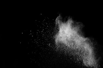 White powder explosion on black background. 