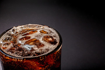 Fizz sparkling Cola water Refreshing bubbly Soda Pop with Ice Cubes. Cold soft drink cola...