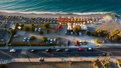 drone view of colorful umbrellas in rhodes, greece 