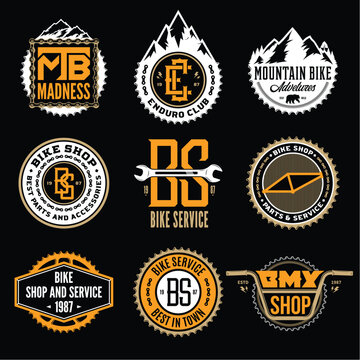 Set of vector bike shop, bicycle service, mountain biking clubs and adventures logo, badges and icons isolated on a black background