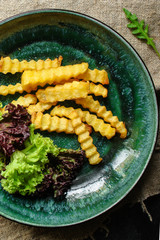 french fries and sauce (delicious snack, fast food, deep fried potatoes) menu concept. food background. copy space. Top view