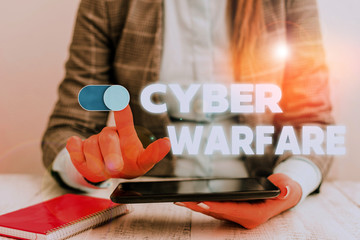 Conceptual hand writing showing Cyber Warfare. Concept meaning Virtual War Hackers System Attacks...