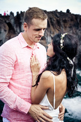 Happy couple just married at the oceanside