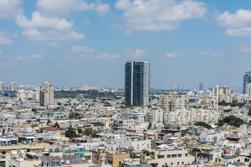 Fototapeta na wymiar Aerial view of Tel Aviv City with modern skylines against the blue sky in the downtown of Tel Aviv, Israel.