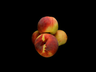 peach isolated on black background