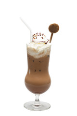Ice coffee in tall glass with cream, chocolate sauce and curl