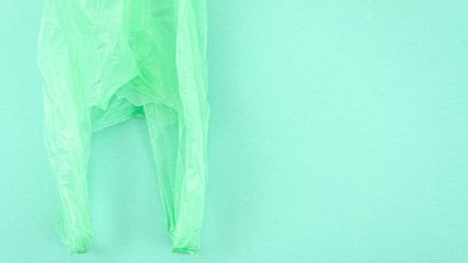 Top view plastic bag on color background