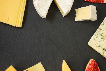 cheese variety (delicious snack, different types of hard and soft cheese) menu concept. food background. copy space. Top view