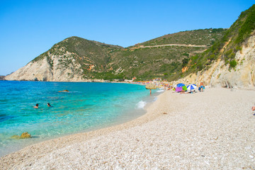 Beautiful turquoise crystal clear waters in Petani beach in Kefalonia, Greece