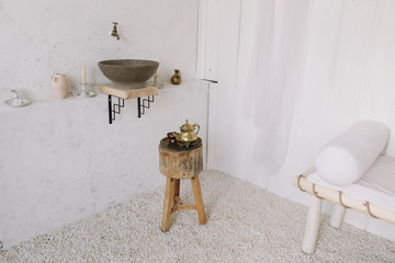Wash basin vintage. Retro stoned sink. romantic vintage bathroom interior. Design loft  with wood...