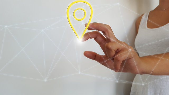 Businesswoman touching digital localisation map
