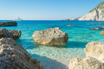 Beautiful turquoise crystal clear waters in Petani beach in Kefalonia, Greece