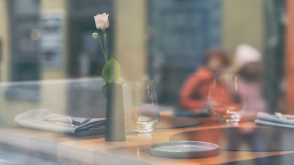Reflection of a street in a restaurant window