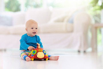 Baby boy playing with toy