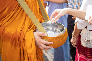 The monks of the Buddhist Sangha(give alms to a Buddhist monk), which came out of the Buddhist...
