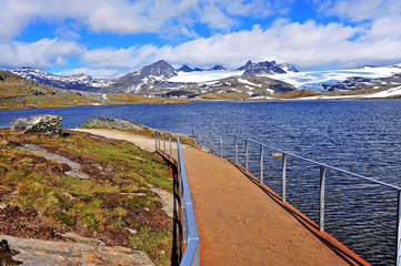 Scenic landscape with the lake and mountains