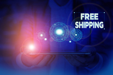 Handwriting text writing Free Shipping. Conceptual photo Freight Cargo Consignment Lading Payload Dispatch Cartage Woman wear formal work suit presenting presentation using smart device