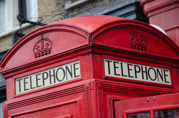 Old Red London telephone booth close up