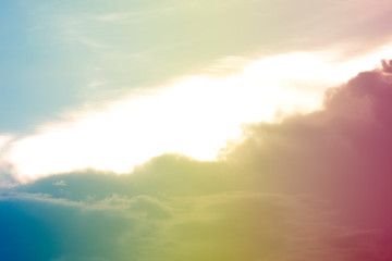 Naklejka premium A soft fog cloug background with pastel colored orange to blue gradient